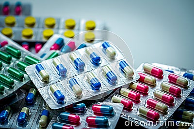 Pile of antibiotic capsule pills in blister pack. Pharmaceutical packaging. Medicine for infections disease. Stock Photo