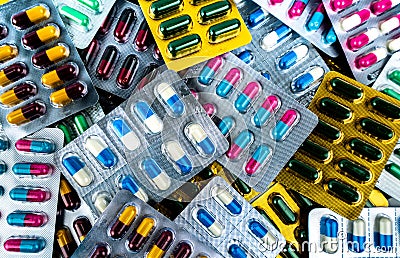 Pile of antibiotic capsule pills in blister packs. Medicine for infection disease. Antibiotic drug use with reasonable. Stock Photo