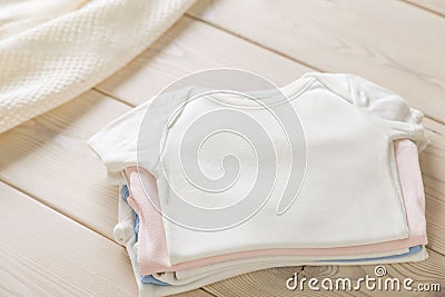 Pile of baby shirts Stock Photo