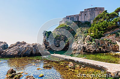 Pile Bay near Dubrovnik old town with fortress Lovrijenac Stock Photo