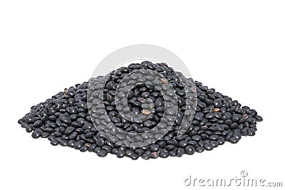 Pile Black Beluga Lentils isolated on white. Stock Photo