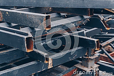 Pile of the black rusty metal tube Stock Photo