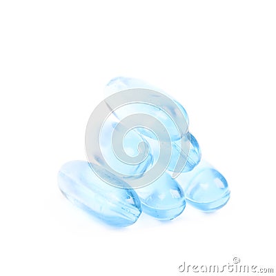 Pile of blue softgel pills isolated Stock Photo