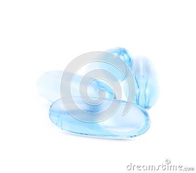 Pile of blue softgel pills isolated Stock Photo