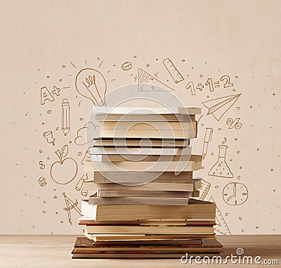 A pile of books on table with school hand drawn doodle sketches Stock Photo