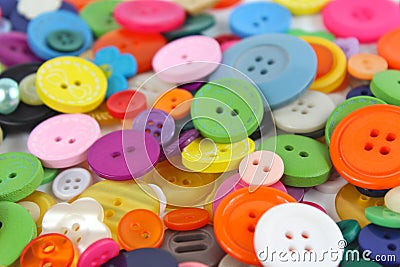 Pile of brightly coloured haberdashery buttons Stock Photo