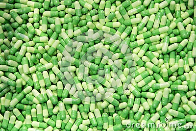 The pile of capsule drug in the container. Stock Photo