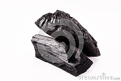 Pile of charcoal, burnt pieces of coal, with space for text on white background Stock Photo