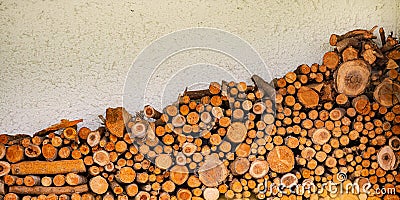 Pile of chopped lumber near house in Germany Stock Photo