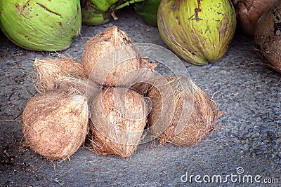 Pile of coconuts sale at market Stock Photo