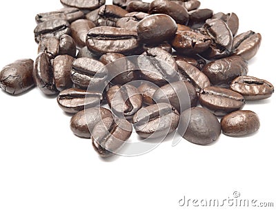 a pile of coffee beans medium roast solated on white background with copy space Stock Photo