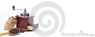 Pile of coffee beans, coffee grinder, ground coffee on a white background. Top view. Banner Stock Photo