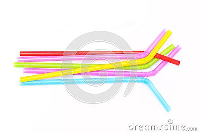 Pile of colorful plastic drinking straws isolated on white background. Stock Photo