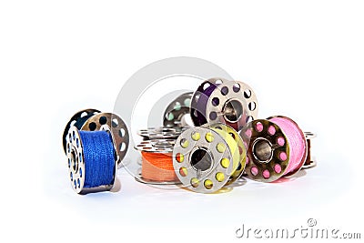 Pile of colorful thread spools Stock Photo