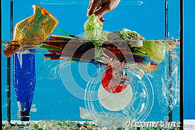 Pile of crumples plastic colorful trash being thrown Stock Photo