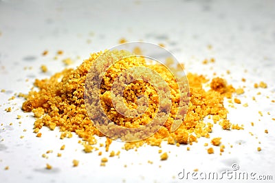 A pile of delicious yellow cookie powder Stock Photo