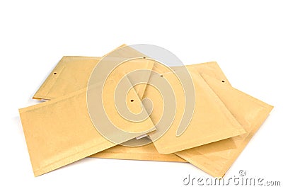 Pile different size bubble lined shipping or packing envelopes Stock Photo