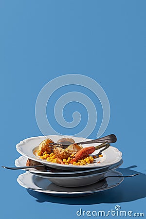 pile dirty plates leftovers copy space. High quality photo Stock Photo