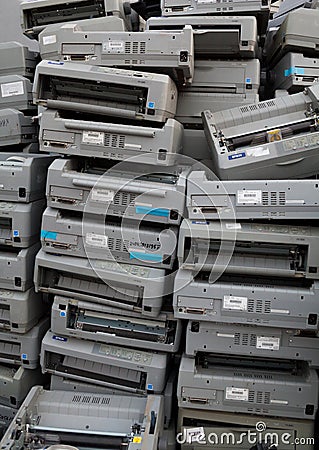 Pile of dot matrix printers on the landfill Editorial Stock Photo