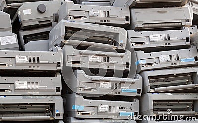 Pile of dot matrix printers on the landfill Editorial Stock Photo