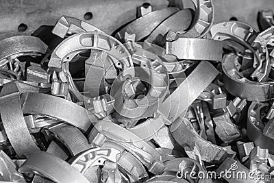 The pile of drum brake shoe from aluminum die casting process Stock Photo