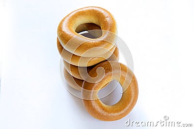 Pile of dry bagels on white background Stock Photo