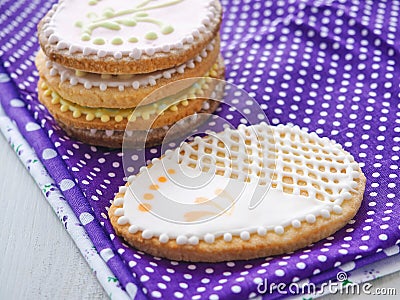 Pile of Easter sugar cookies glazed with royal icing. Stock Photo