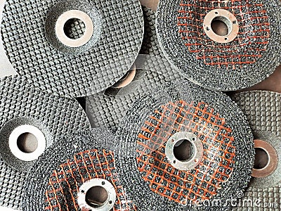 pile of Electrical cutting and grinding machine circular blades isolated Stock Photo