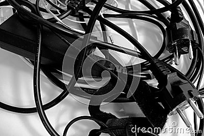 A pile of entangled cords in black and white Stock Photo