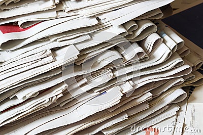 A pile of fold newspapers background Stock Photo