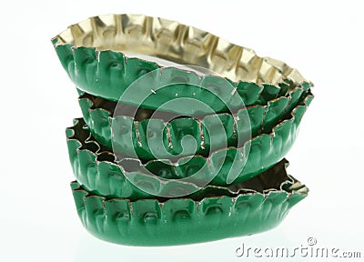 Pile of green beer caps Stock Photo