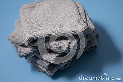 Pile of grey facecloths Stock Photo