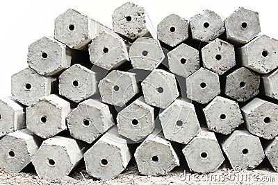 The pile of hexagon concrete foundation piles isolated Stock Photo