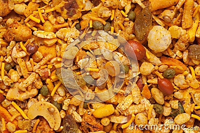 Pile of Indian spicy snacks mixed Namkeen full-frame wallpaper, fried peanut, corn flakes, sweet pea Stock Photo