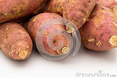 Pile of Japanese potato isolated on white background Stock Photo