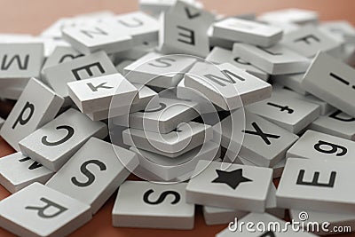 Pile of Letter Tiles on a red background Stock Photo