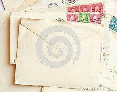 Pile of letters, post stamps and blank envelope Editorial Stock Photo