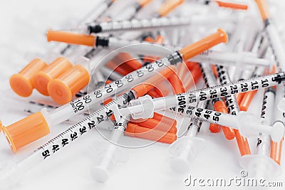 Pile of medical syringes for insulin for diabetes Stock Photo