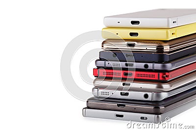 Pile of mobile phone. Heap of the different smartphones Stock Photo