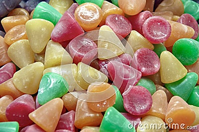A Pile of Multi Coloured Jelly Sweets in Orange, Yellow, Green and Red. Stock Photo