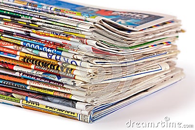 A pile of newspapers isolated Stock Photo