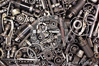 Pile of old bicycle parts and tools Stock Photo