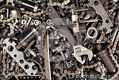 Pile of old bicycle parts and tools Stock Photo