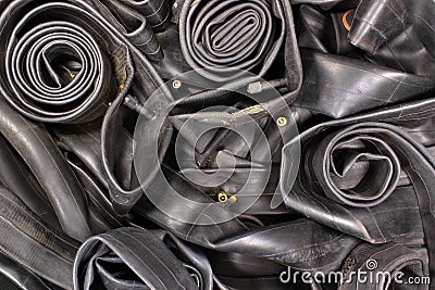 Pile of old bicycle rubber tire tubes Stock Photo