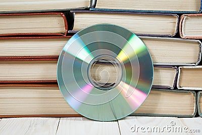 Book with compact disc over white background e book or digital storage concept Stock Photo