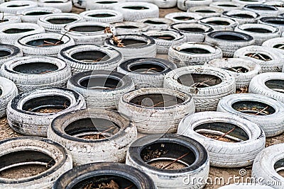 White disused and discarded tires Editorial Stock Photo