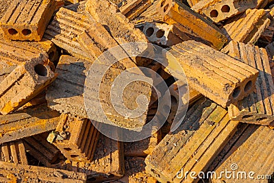 Pile of old red bricks in construction area Stock Photo