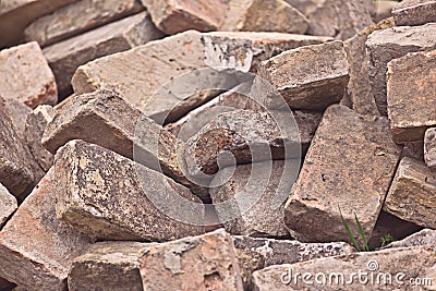 Pile of Old Used Bricks as Construction Material Stock Photo