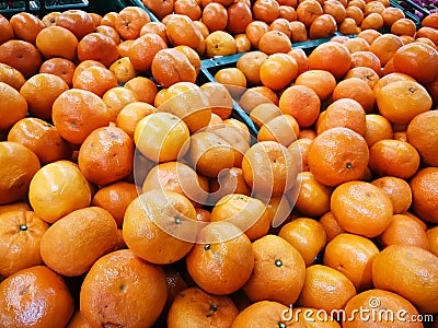 Pile of organic oranges for sale at local farmers market,Fresh m Stock Photo