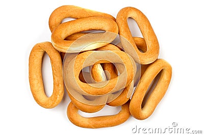 Pile of oval bagels on white background. Top view. Stock Photo